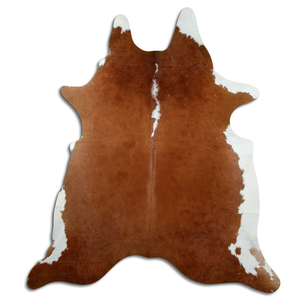 Brown and white cowhide rug of about 220 × 200 cm, seen from above: the exact hide you receive