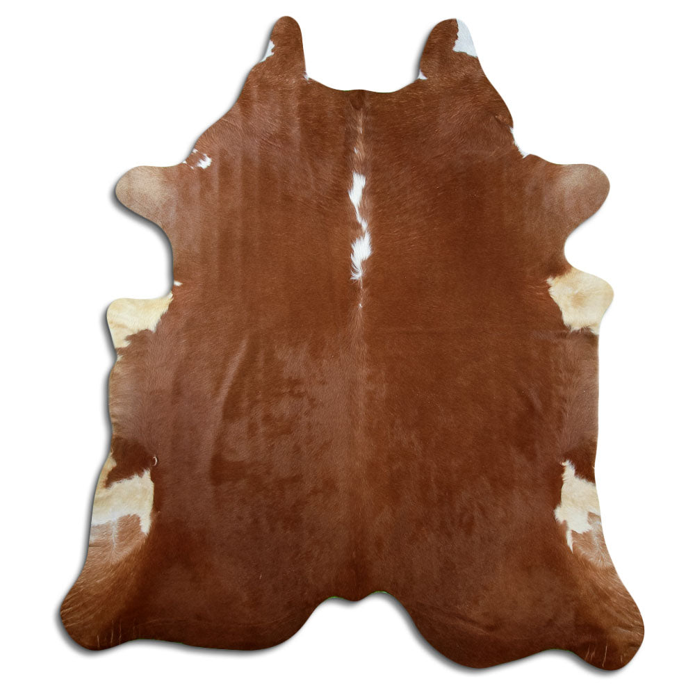Brown and white cowhide rug of about 230 × 210 cm, seen from above: the exact hide you receive