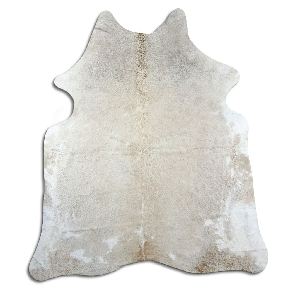 Champagne cowhide rug of about 200 × 170 cm, seen from above: the exact hide you receive