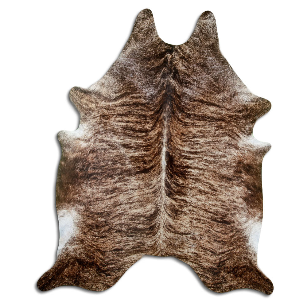 Brindle cowhide rug of about 220 × 180 cm, seen from above: the exact hide you receive