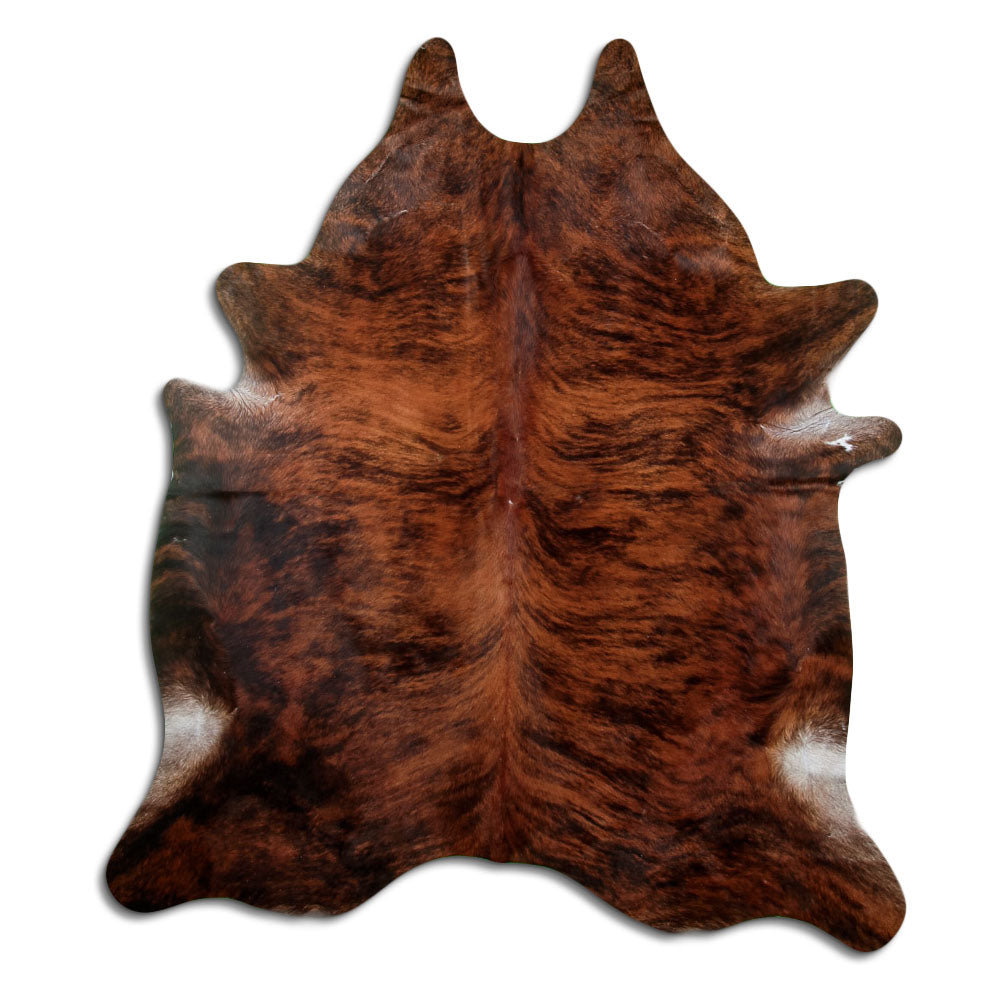 Brindle cowhide rug of about 210 × 180 cm, seen from above: the exact hide you receive