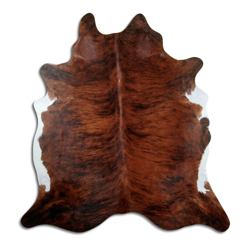 Brindle cowhide rug of about 210 × 200 cm, seen from above: the exact hide you receive