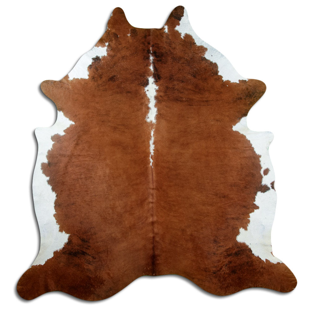 Brindle cowhide rug of about 220 × 210 cm, seen from above: the exact hide you receive