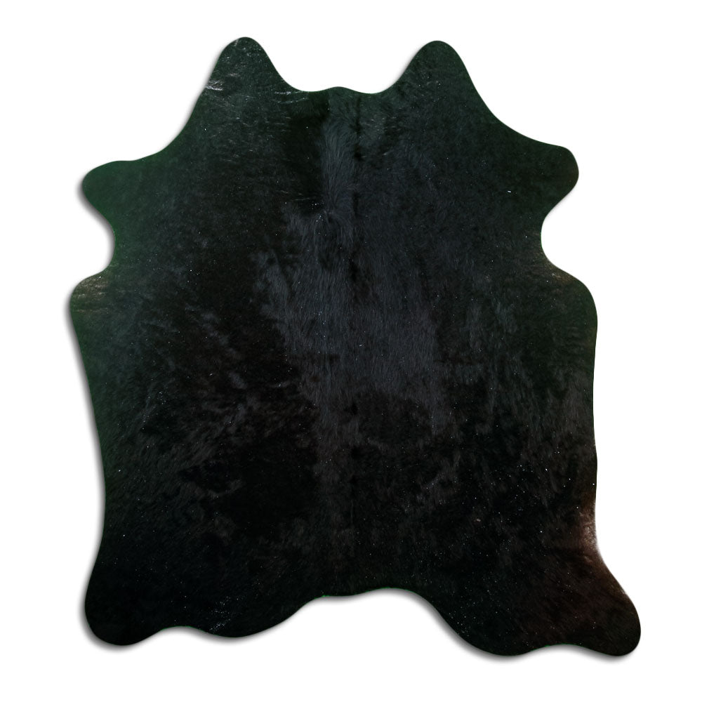 Black cowhide rug of about 180 × 160 cm, seen from above: the exact hide you receive