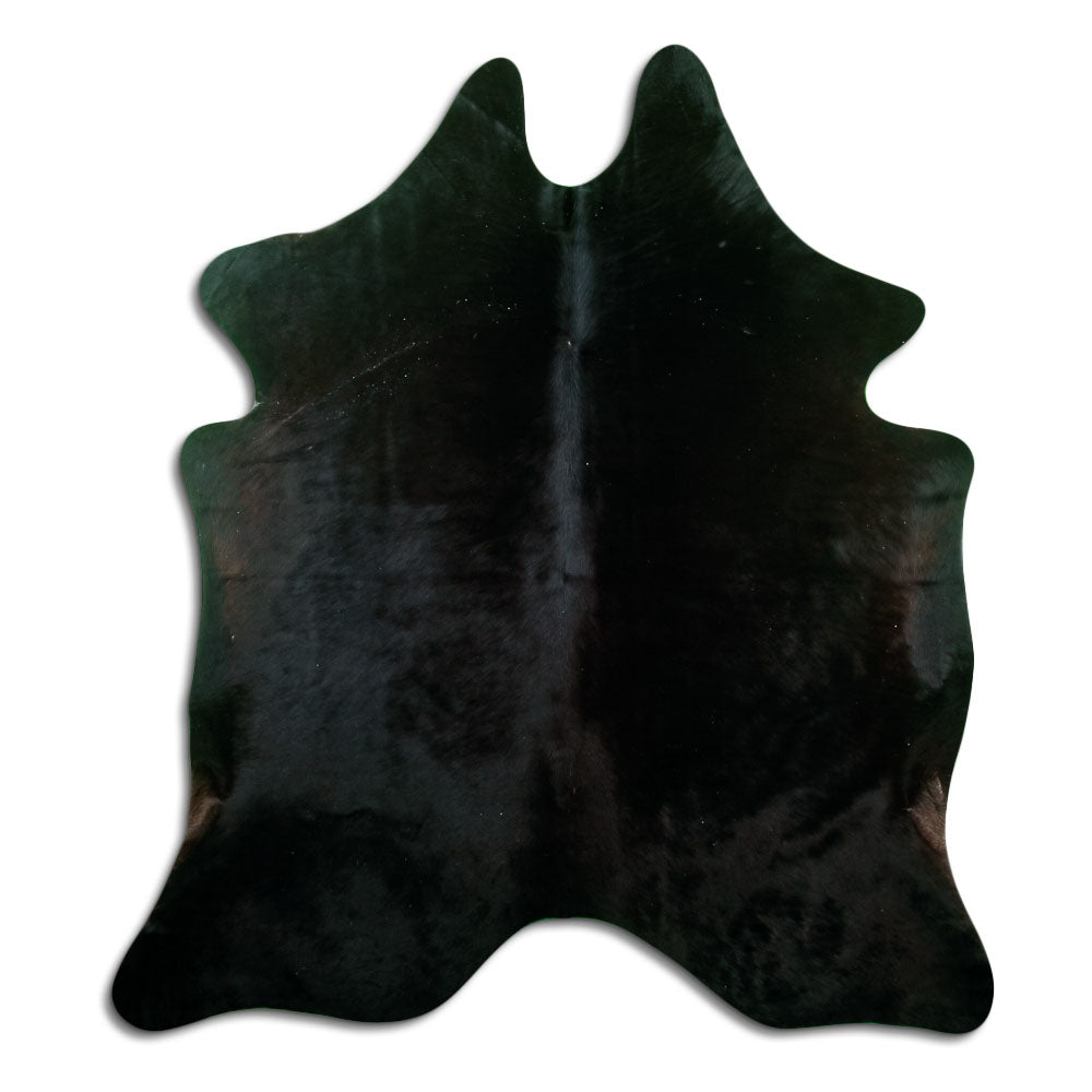 Black cowhide rug of about 180 × 160 cm, seen from above: the exact hide you receive