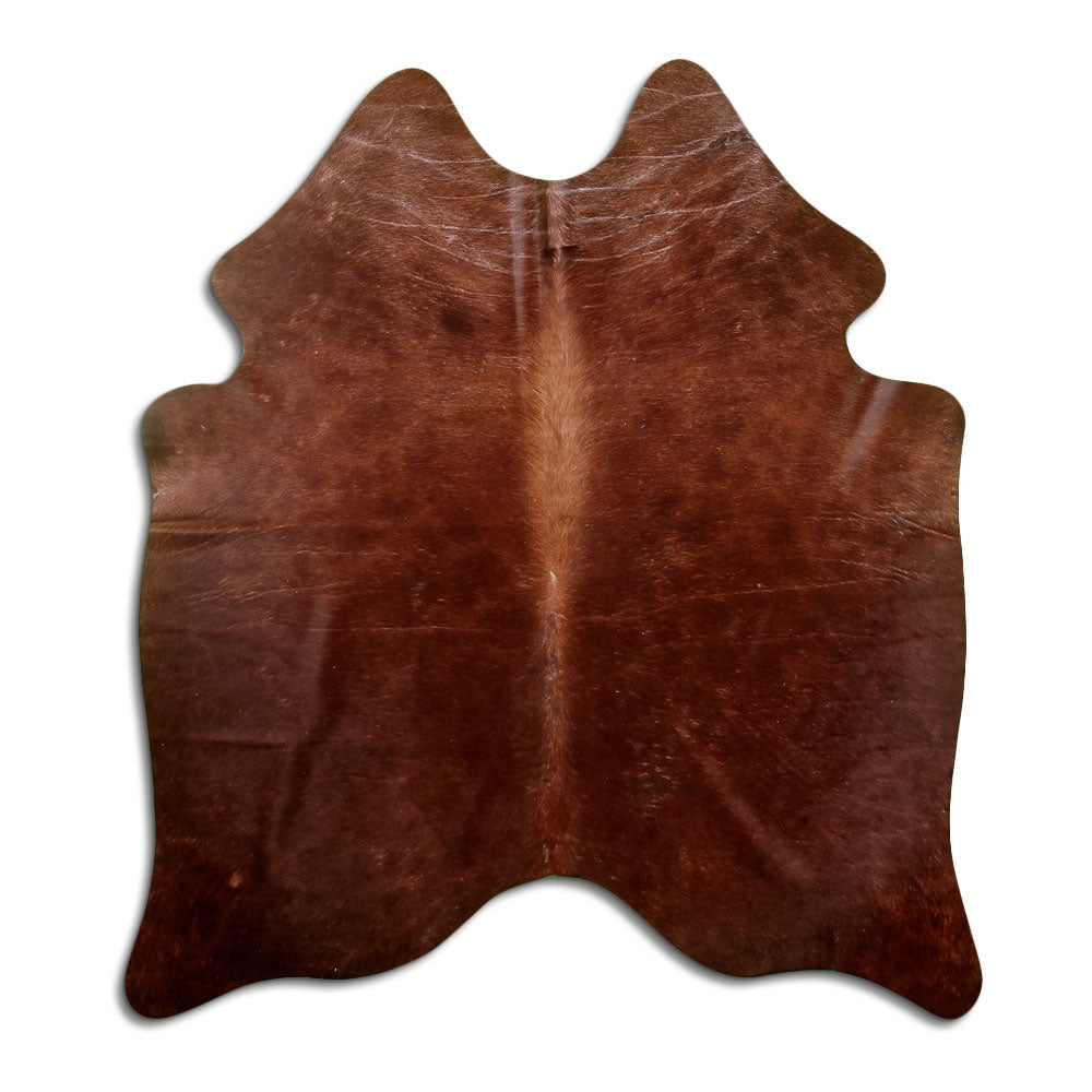 Brown cowhide rug of about 170 × 150 cm, seen from above: the exact hide you receive
