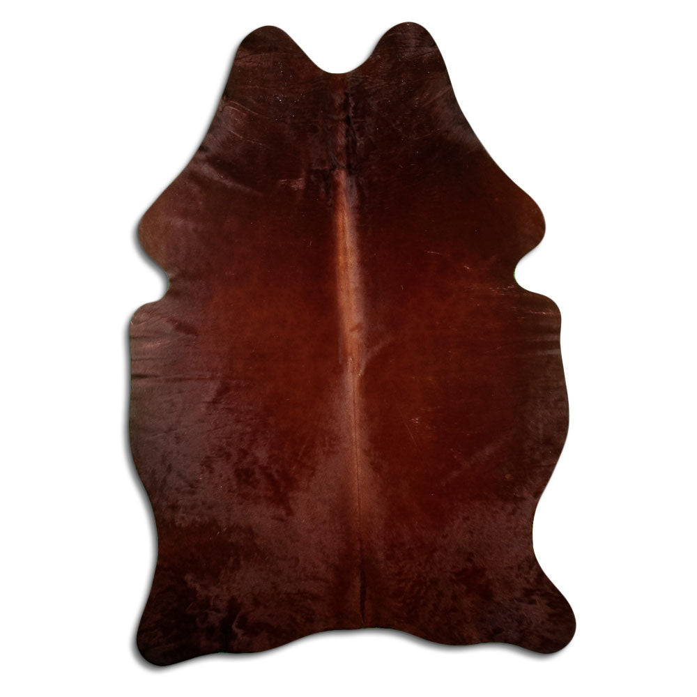 Brown cowhide rug of about 210 × 140 cm, seen from above: the exact hide you receive