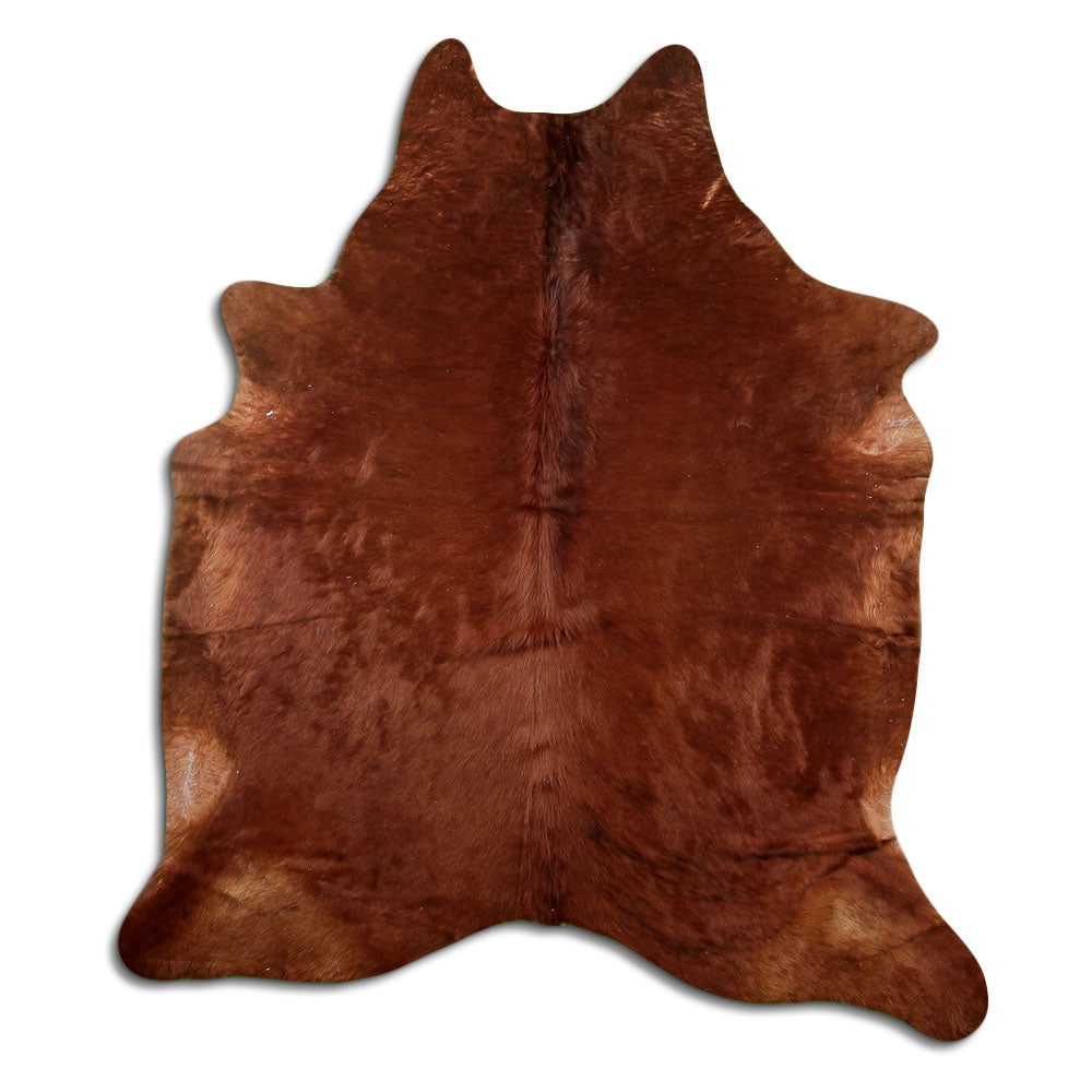 Brown cowhide rug of about 210 × 180 cm, seen from above: the exact hide you receive