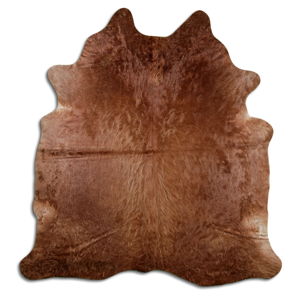 Brown cowhide rug of about 210 × 190 cm, seen from above: the exact hide you receive