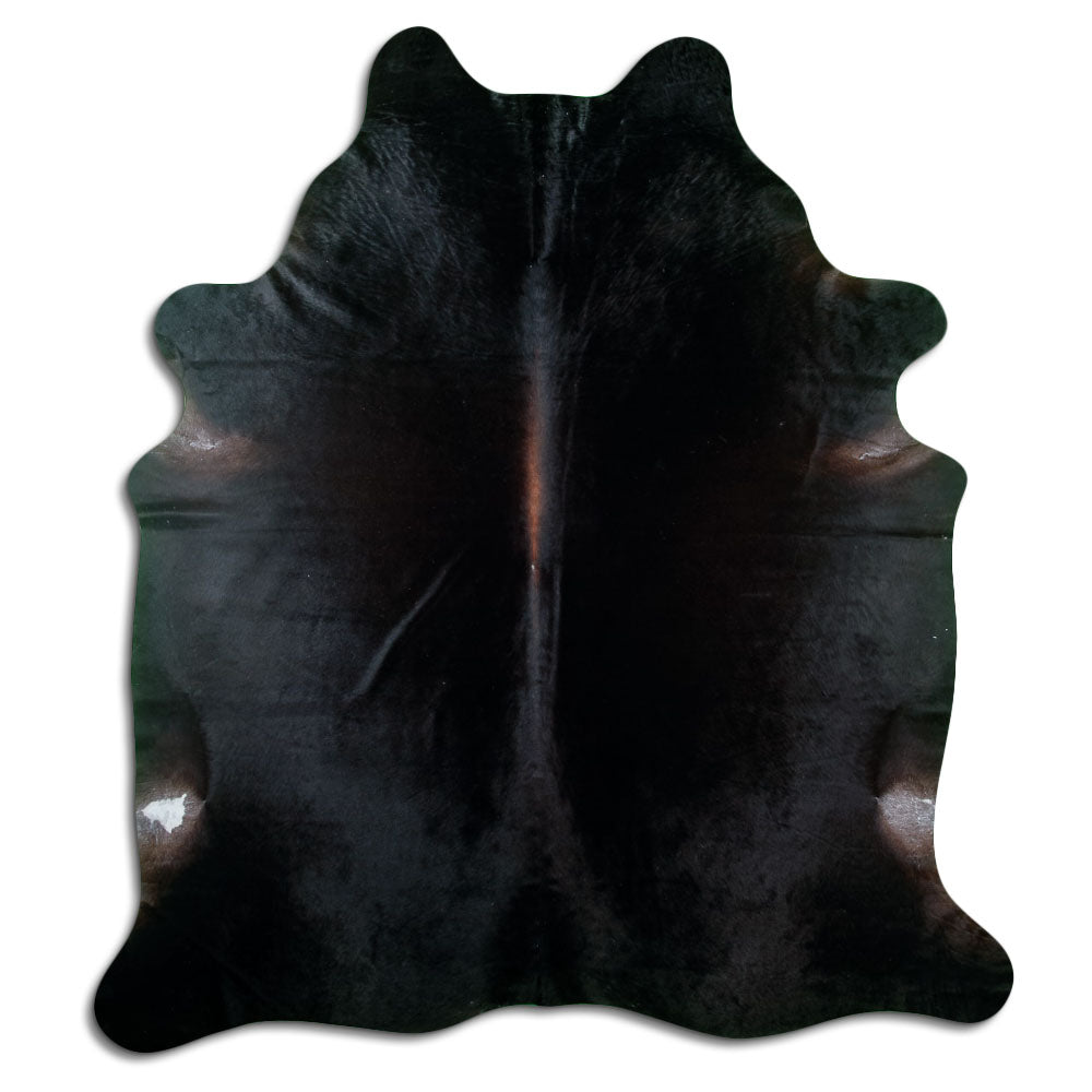 Brown cowhide rug of about 240 × 210 cm, seen from above: the exact hide you receive
