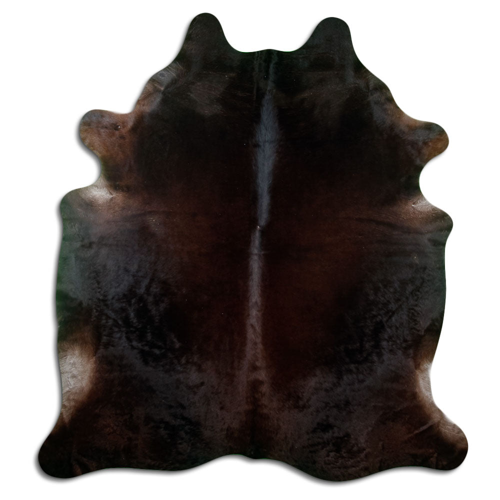 Brown cowhide rug of about 220 × 200 cm, seen from above: the exact hide you receive