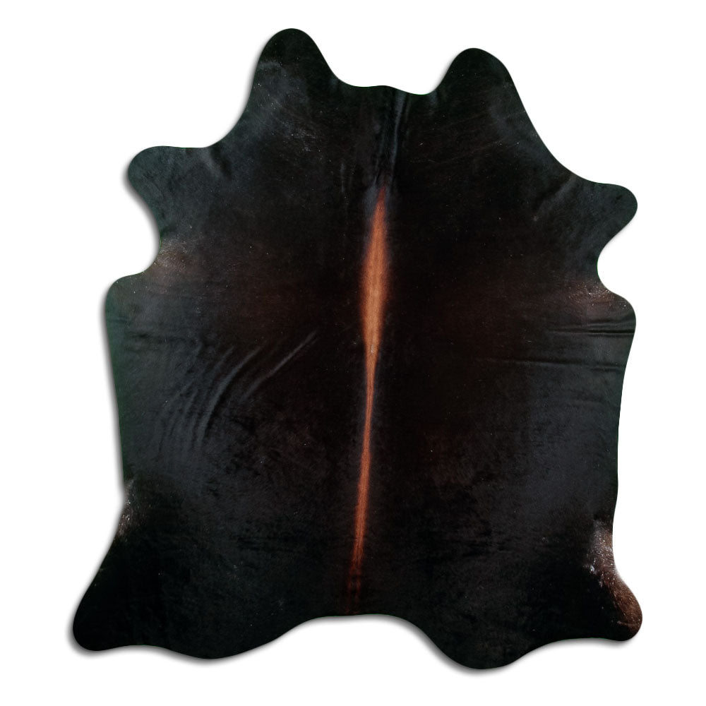 Brown cowhide rug of about 210 × 180 cm, seen from above: the exact hide you receive