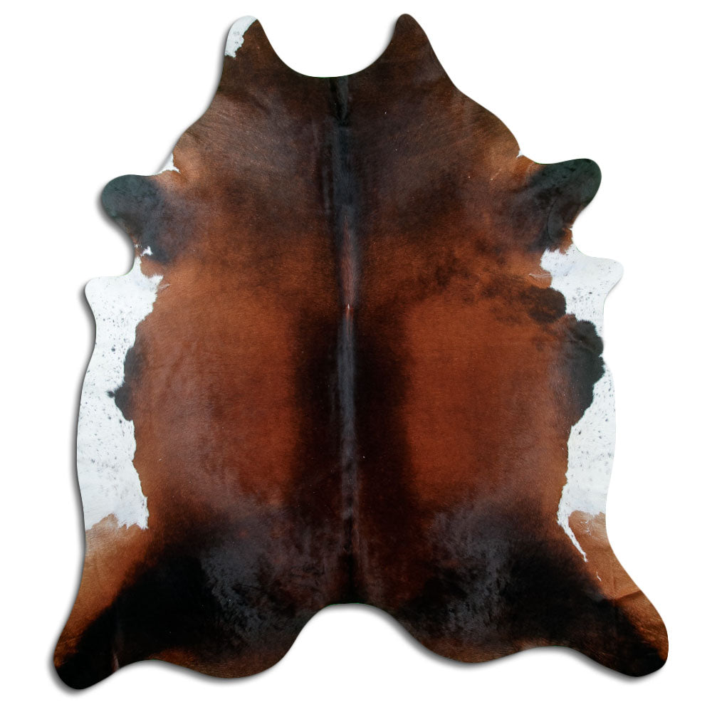 Brown cowhide rug of about 240 × 220 cm, seen from above: the exact hide you receive