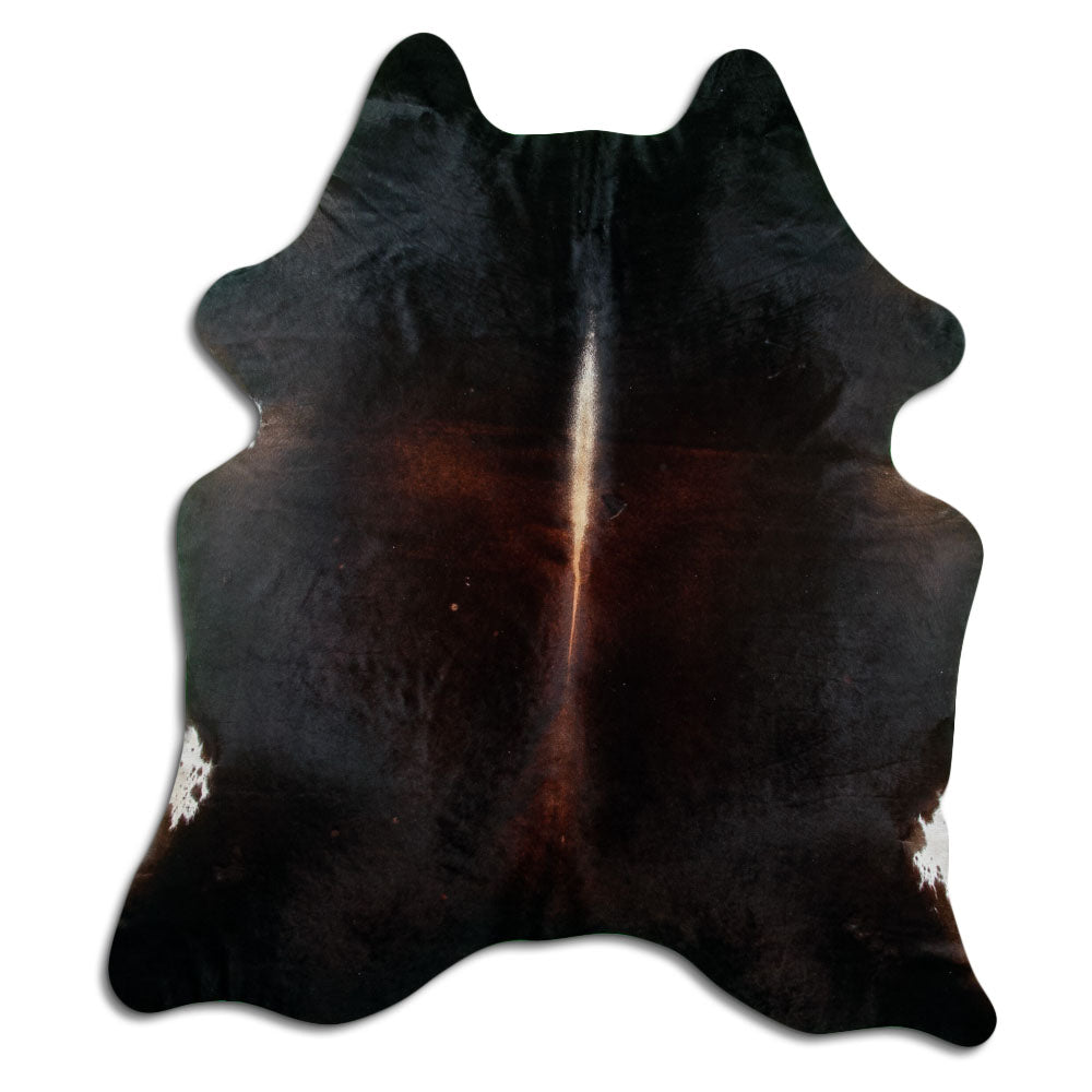 Brown cowhide rug of about 220 × 200 cm, seen from above: the exact hide you receive