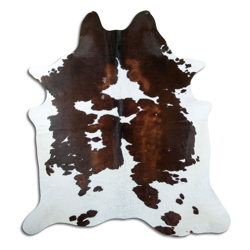 Tricolour cowhide rug of about 200 × 190 cm, seen from above: the exact hide you receive