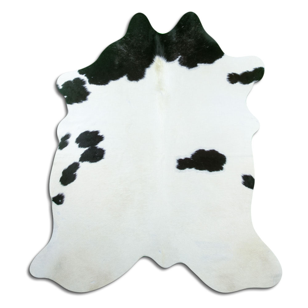 Black and white cowhide rug of about 180 × 170 cm, seen from above: the exact hide you receive