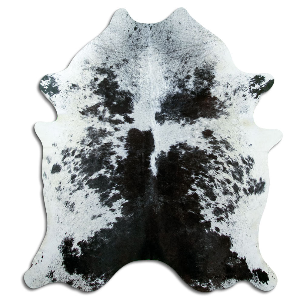 Black and white cowhide rug of about 190 × 170 cm, seen from above: the exact hide you receive