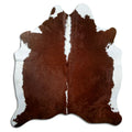 Brown and white cowhide rug of about 190 × 170 cm, seen from above: the exact hide you receive