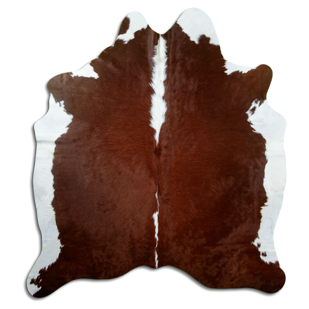 Brown and white cowhide rug of about 190 × 170 cm, seen from above: the exact hide you receive