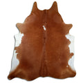 Brown and white cowhide rug of about 230 × 190 cm, seen from above: the exact hide you receive