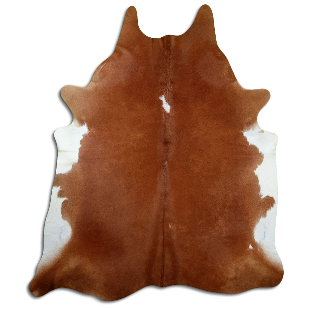 Brown and white cowhide rug of about 230 × 190 cm, seen from above: the exact hide you receive