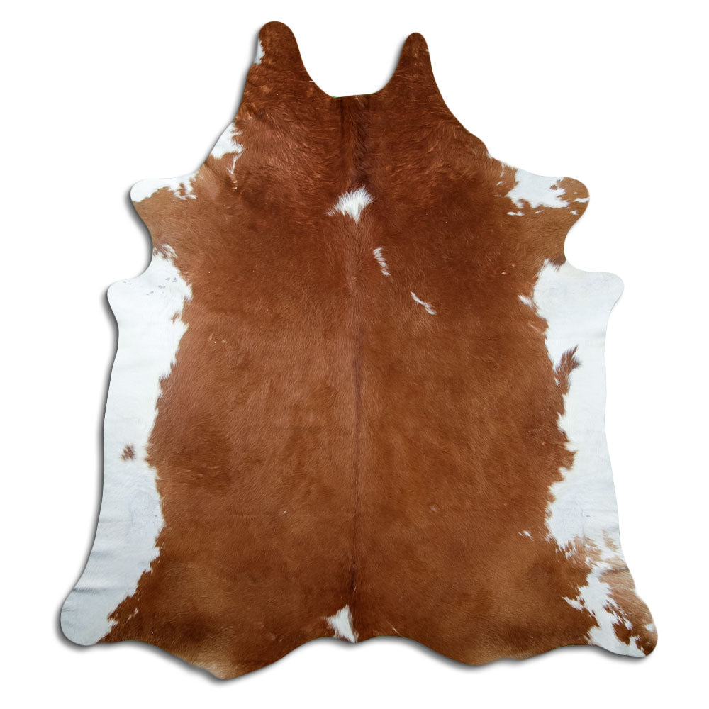 Brown and white cowhide rug of about 240 × 220 cm, seen from above: the exact hide you receive