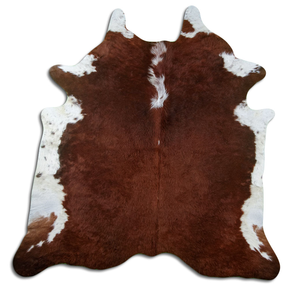 Brown and white cowhide rug of about 200 × 200 cm, seen from above: the exact hide you receive