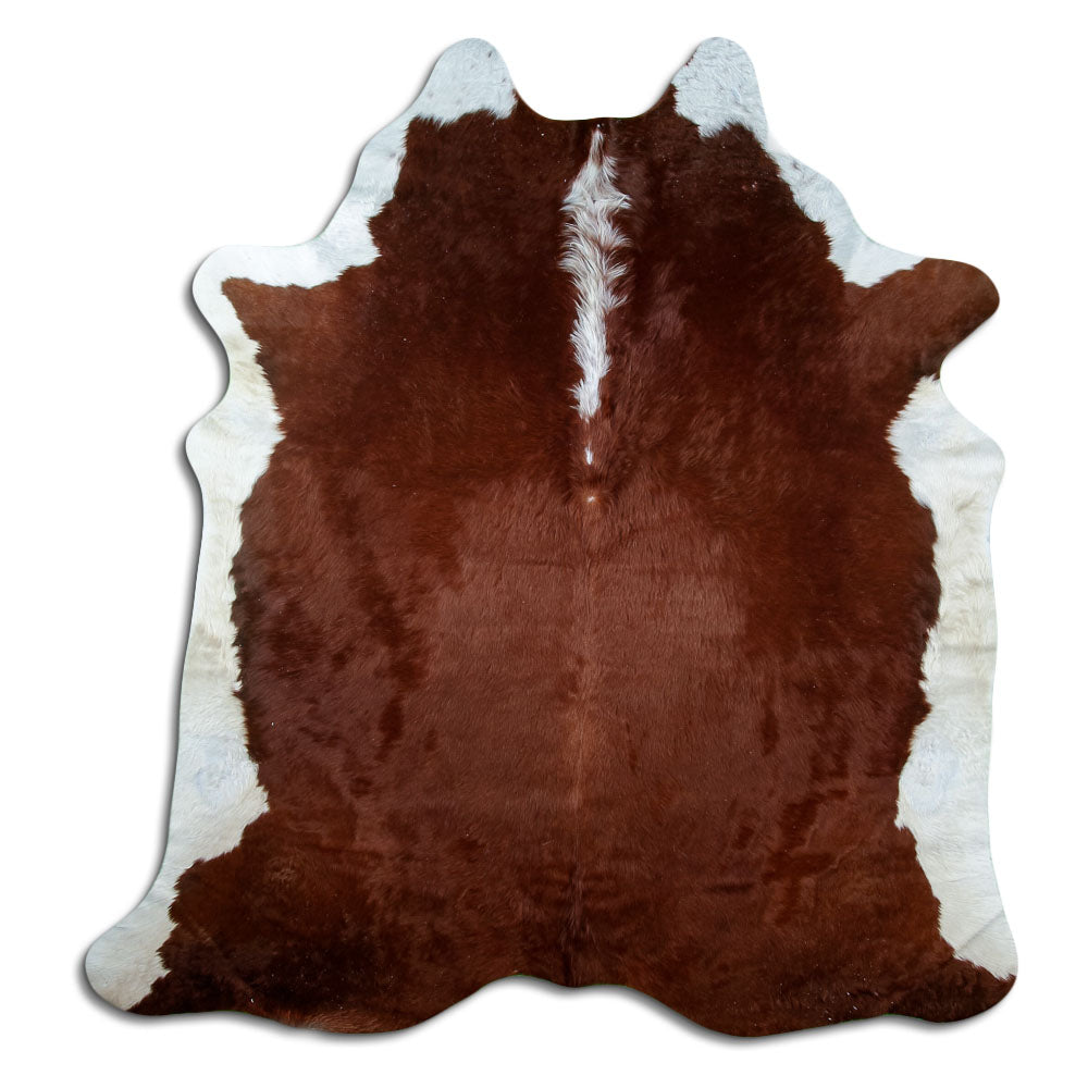 Brown and white cowhide rug of about 210 × 200 cm, seen from above: the exact hide you receive