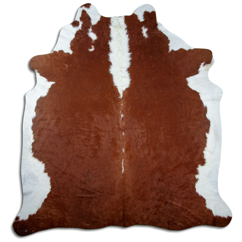 Brown and white cowhide rug of about 240 × 220 cm, seen from above: the exact hide you receive