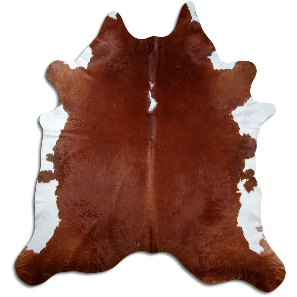 Brown and white cowhide rug of about 230 × 220 cm, seen from above: the exact hide you receive