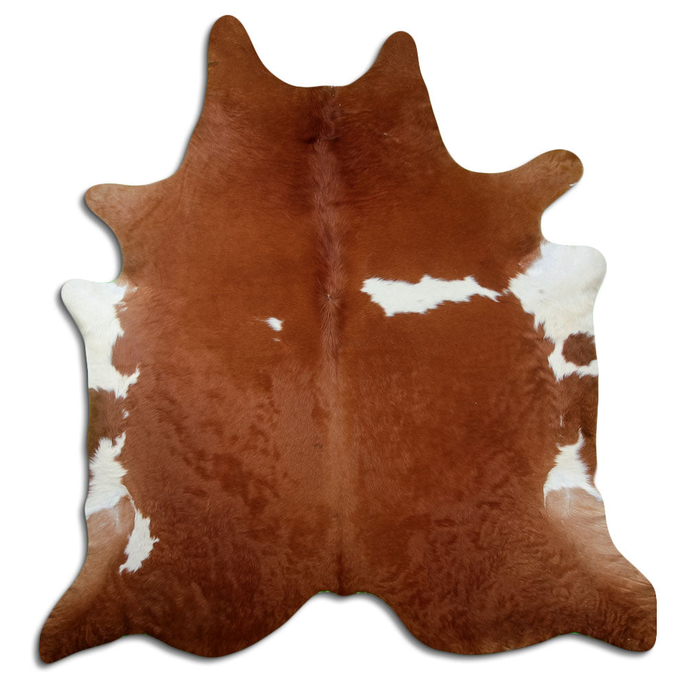 Brown and white cowhide rug of about 230 × 220 cm, seen from above: the exact hide you receive