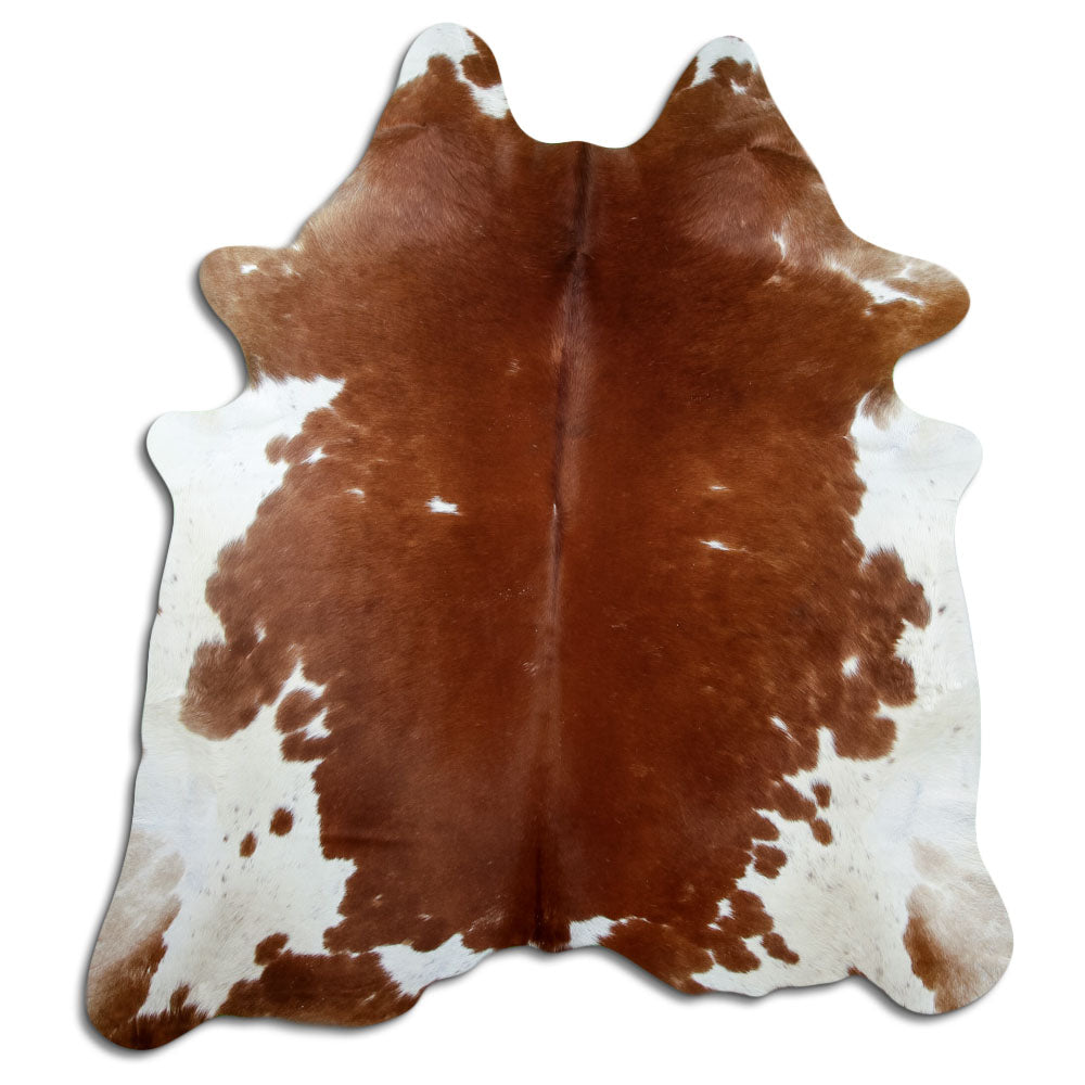Brown and white cowhide rug of about 190 × 180 cm, seen from above: the exact hide you receive