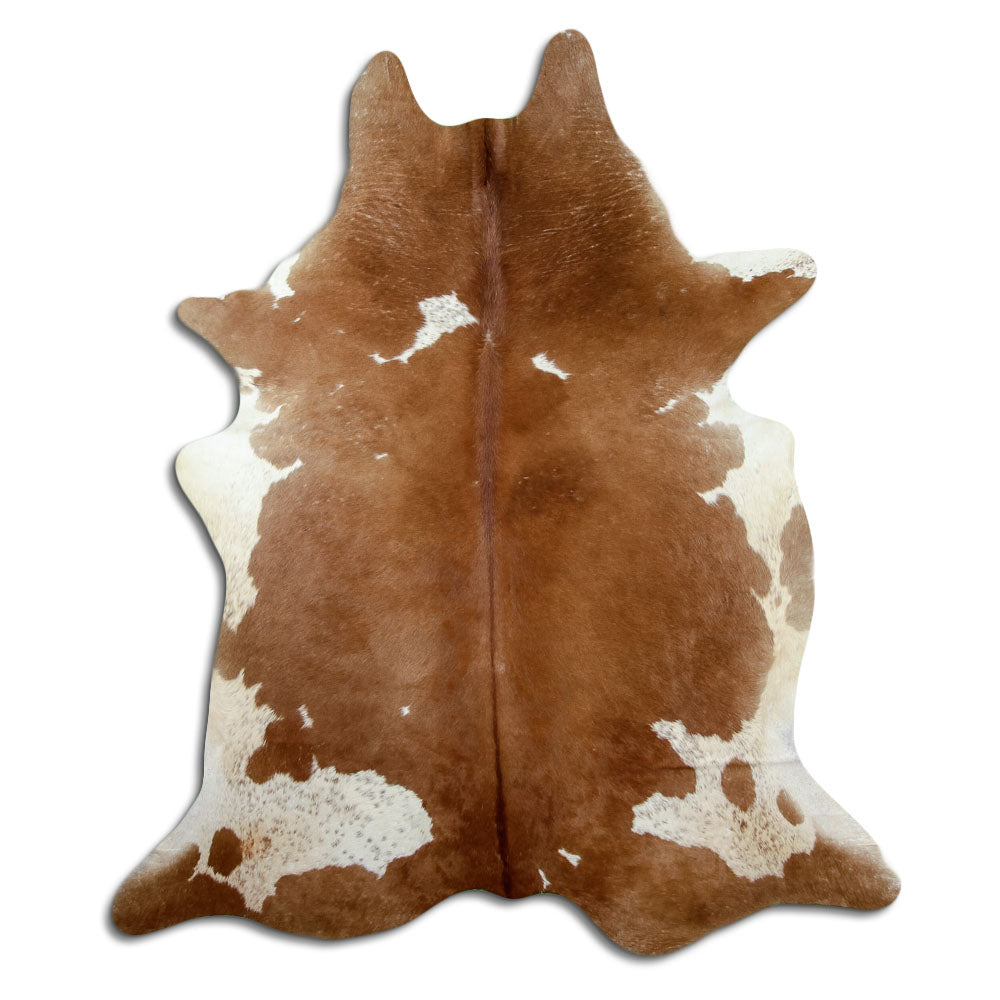 Brown and white cowhide rug of about 220 × 190 cm, seen from above: the exact hide you receive