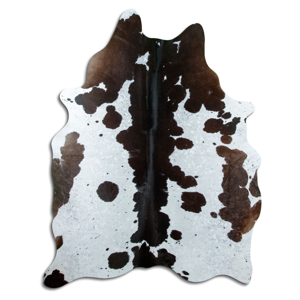 Brown and white cowhide rug of about 220 × 160 cm, seen from above: the exact hide you receive