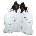 Brown and white cowhide rug of about 180 × 170 cm, seen from above: the exact hide you receive