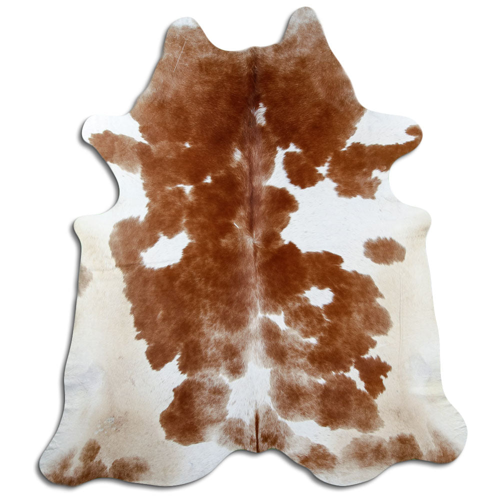Brown and white cowhide rug of about 220 × 200 cm, seen from above: the exact hide you receive