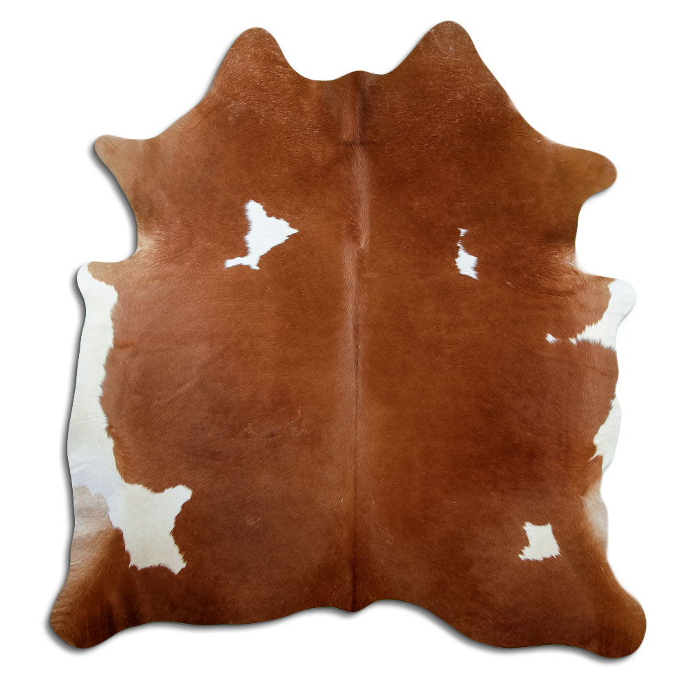 Brown and white cowhide rug of about 200 × 190 cm, seen from above: the exact hide you receive