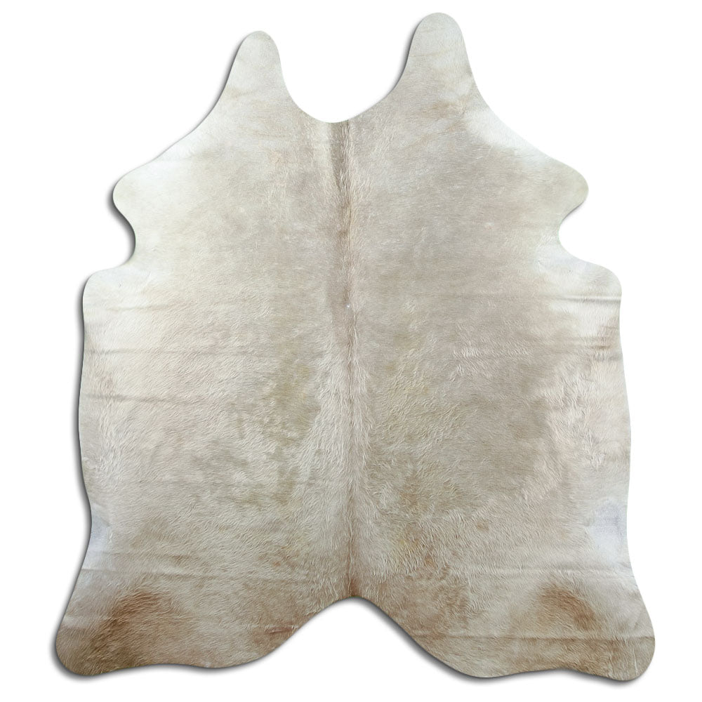Champagne cowhide rug of about 190 × 170 cm, seen from above: the exact hide you receive