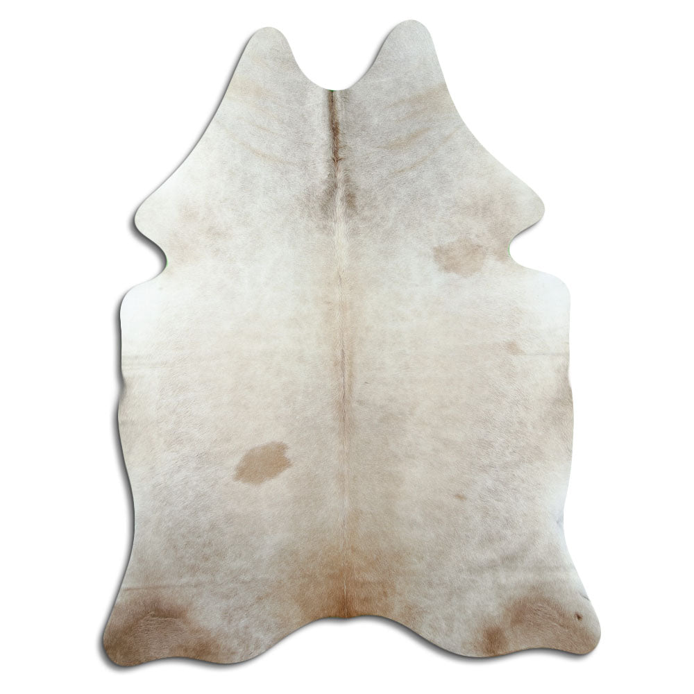 Champagne cowhide rug of about 210 × 160 cm, seen from above: the exact hide you receive