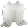 Champagne cowhide rug of about 180 × 180 cm, seen from above: the exact hide you receive