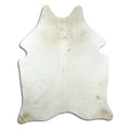 Champagne cowhide rug of about 200 × 160 cm, seen from above: the exact hide you receive