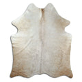 Champagne cowhide rug of about 170 × 150 cm, seen from above: the exact hide you receive
