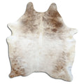 Champagne cowhide rug of about 200 × 160 cm, seen from above: the exact hide you receive