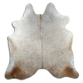 Champagne cowhide rug of about 210 × 200 cm, seen from above: the exact hide you receive