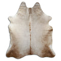 Champagne cowhide rug of about 230 × 200 cm, seen from above: the exact hide you receive