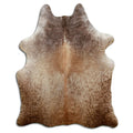 Champagne cowhide rug of about 180 × 150 cm, seen from above: the exact hide you receive