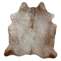 Champagne cowhide rug of about 160 × 160 cm, seen from above: the exact hide you receive