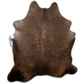 Champagne cowhide rug of about 200 × 170 cm, seen from above: the exact hide you receive