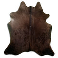 Champagne cowhide rug of about 200 × 190 cm, seen from above: the exact hide you receive