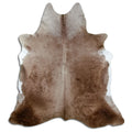 Champagne cowhide rug of about 210 × 190 cm, seen from above: the exact hide you receive